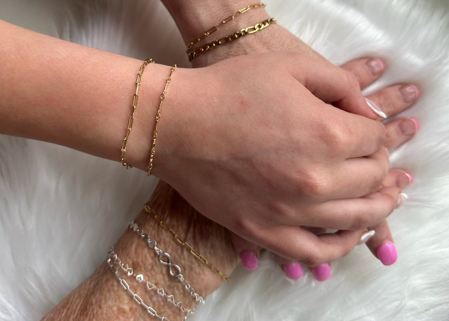 Bracelets on Arms Piled